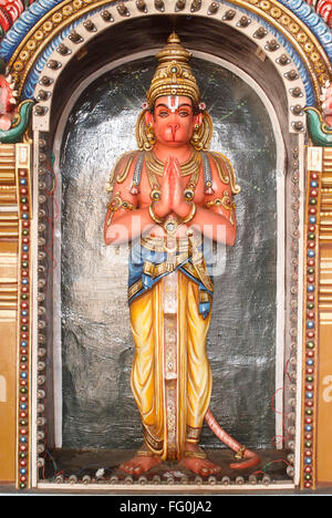 Richly decorated statue lord Hanuman Namaskar posture Sri Ranganathswami temple Srirangam Tiruchirapalli Trichy Tamil Nadu Stock Photo