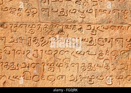 Indian inscriptions carved into a temple wall, Brihadeeswarar Temple ...