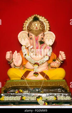Richly decorated idol of lord Ganesh elephant headed god for Ganpati festival at Pune , Maharashtra , India Stock Photo