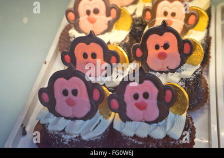 Chinese New year of the Monkey themed cake ina bakery in Chinatown, London, UK Stock Photo