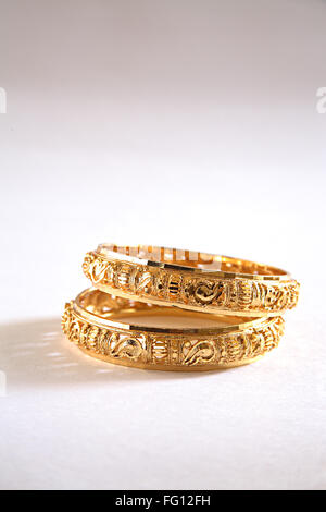 Concept , kangan gold bangle worn on wrist on white background Stock ...