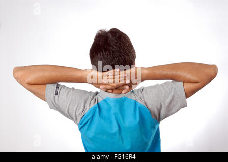 South Asian Indian man doing exercise keeping both hand back side of head MR#628 Stock Photo