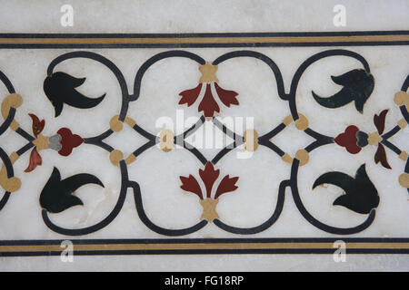 Marble inlay work of interlocking designs on wall of  Taj Mahal Seventh Wonders of World , Agra , Uttar Pradesh Stock Photo