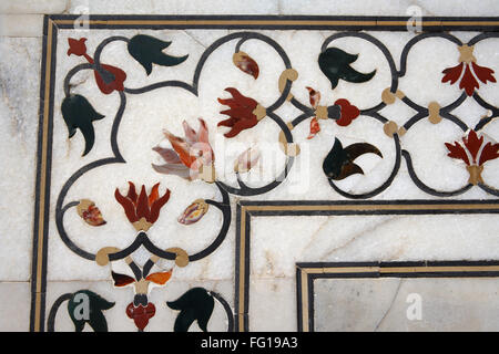 Marble inlay work of interlocking designs on wall of  Taj Mahal Seventh Wonders of World , Agra , Uttar Pradesh Stock Photo