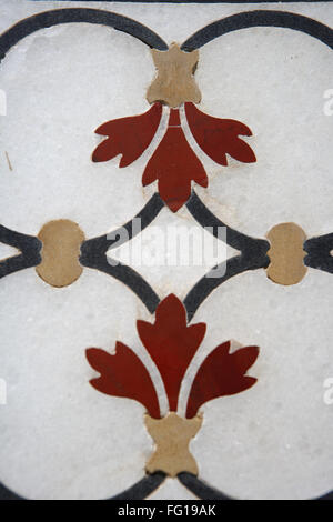 Marble inlay work of interlocking designs on wall of Taj Mahal Seventh Wonders of World , Agra , Uttar Pradesh Stock Photo