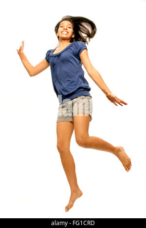 Young girl laughing and jumping with joy MR#364 Stock Photo