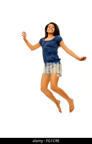 Young girl laughing jumping with joy MR#364 Stock Photo