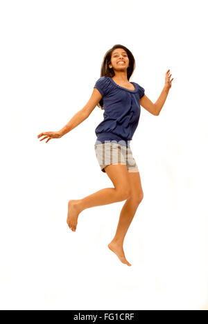 Young girl laughing jumping with joy MR#364 Stock Photo