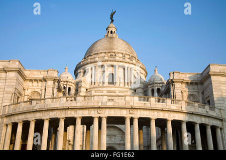Victoria memorial impressive reminder of British Raj dome with moving angel statue , Calcutta now Kolkata West Bengal Stock Photo