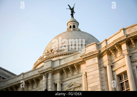Victoria memorial impressive reminder of British Raj dome with moving angel statue , Calcutta now Kolkata West Bengal Stock Photo