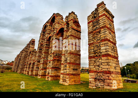 a view of the remains of the ancient roman aqueduct Acueducto de los Milagros in Merida, Spain Stock Photo