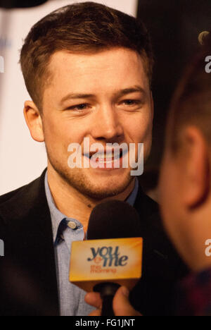 Chicago, Illinois, USA. 16th Feb, 2016. Stars of the movie Hugh Jackman and Taron Egerton with director Dexter Fletcher came to Chicago for the premiere of their new movie ''Eddie the Eagle.'' The movie is based on the true story of a British Olympic ski jumper who persevered despite the obstacles put in his way. His enthusiasm and unbounded spirit won the hearts of sports fans. Taron Egerton plays Eddie Edwards, the athlete depicted in this movie.Hugh Jackman plays his rebellious coach. Pictured: Taron Egerton being interviewed at the Chicago premiere. (Credit Image: © Karen I. Hirsch via Z Stock Photo