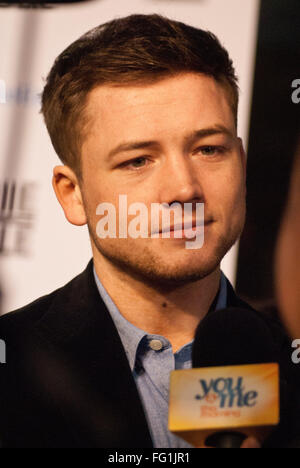 Chicago, Illinois, USA. 16th Feb, 2016. Stars of the movie Hugh Jackman and Taron Egerton with director Dexter Fletcher came to Chicago for the premiere of their new movie ''Eddie the Eagle.'' The movie is based on the true story of a British Olympic ski jumper who persevered despite the obstacles put in his way. His enthusiasm and unbounded spirit won the hearts of sports fans. Taron Egerton plays Eddie Edwards, the athlete depicted in this movie.Hugh Jackman plays his rebellious coach. Pictured: Taron Egerton being interviewed at the Chicago premiere. (Credit Image: © Karen I. Hirsch via Z Stock Photo