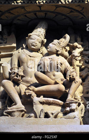 Uma mahesh Shiv Parvati on wall of chitragupta temple Khajuraho madhya pradesh india Stock Photo