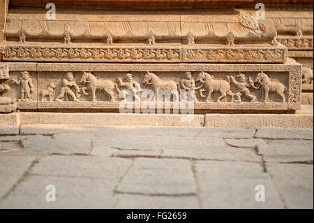 Sculpture of horse trader on the wall of  vitthal temple ; Hampi ; Karnataka ; India Stock Photo