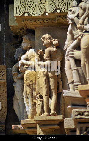 Khajuraho graceful apsara writing letter at lakshmana temple madhya pradesh india Stock Photo