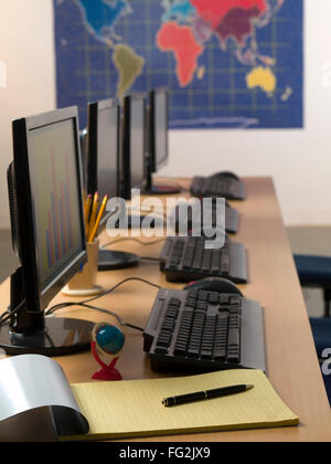 Black monitor keyboard with mouse on desk in office Stock Photo