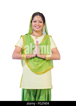 Sikh lady in welcome pose MR#702Z Stock Photo