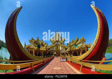 Karaweik Palace floating restaurant, Kandawgyi Lake, built in the shape of a Royal Barge, Yangon, Myanmar Stock Photo