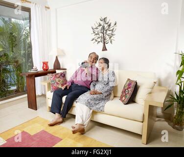 Old couple recording movement in digital camera MR#702T,702S Stock Photo