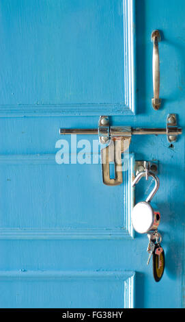 Blue door with latch handle ; lock and key ; Madikeri ; Coorg Kodagu ; Karnataka ; India Stock Photo