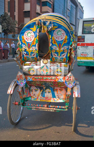 Colourful decorated cycle rickshaw ; Dhaka ; Bangladesh Stock Photo