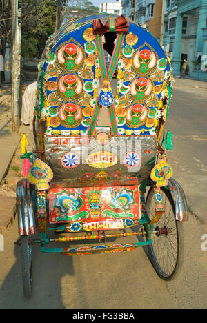 Colourful decorated cycle rickshaw ; Dhaka ; Bangladesh Stock Photo