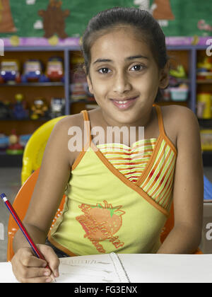 1 Indian School Girl Student Book Study after Sleeping In Library Stock ...