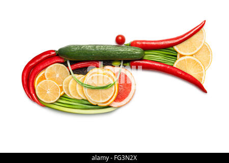 Healthy food concept of a musical wind instrument clarion, trumpet or horn, made of vegetable mix, isolated on white. Stock Photo