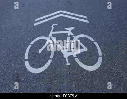 High Angle View Of Bicycle Lane Sign On Road
