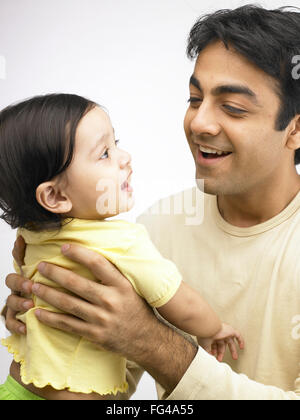 man baby, father daughter, Indian father child, MR#702O&702A Stock Photo