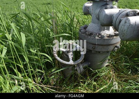 Equipment of an oil well. Shutoff valves and service equipment. Stock Photo