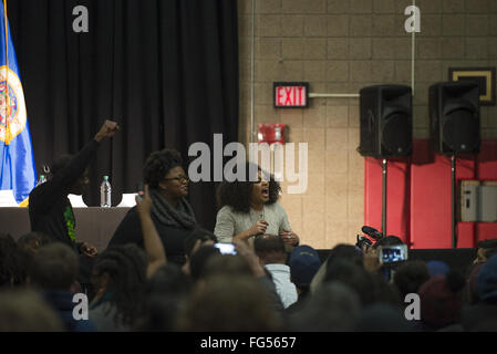 Minneapolis, Minnesota, USA. 13th Feb, 2016. Mica Grimm, a founder of the Minneapolis Black Lives Matter movement, speaks to the audience before Bernie Sanders' appearance. Senator Bernie Sanders of Vermont, who is seeking the Democratic Party nomination for president, attended the Black America Forum, sponsored by MN Neighborhoods Organizing for Change at Patrick Henry High School in the largely African-American neighborhood of North Minneapolis, Minnesota on Friday, February 12, 2016. After beating Hillary Clinton in the New Hampshire primary earlier in the week, Sen. Sanders bega Stock Photo