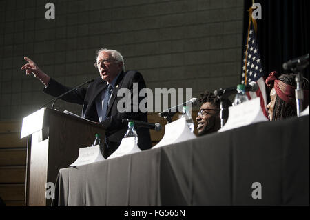 Minneapolis, Minnesota, USA. 13th Feb, 2016. Bernie Sanders delivers a campaign speech during his opening remarks before a panel of African-American activists and an audience of potential voters during the Black America Forum. Senator Bernie Sanders of Vermont, who is seeking the Democratic Party nomination for president, attended the Black America Forum, sponsored by MN Neighborhoods Organizing for Change at Patrick Henry High School in the largely African-American neighborhood of North Minneapolis, Minnesota on Friday, February 12, 2016. After beating Hillary Clinton in the New Ha Stock Photo