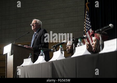 Minneapolis, Minnesota, USA. 13th Feb, 2016. Bernie Sanders delivers a campaign speech during his opening remarks before a panel of African-American activists and an audience of potential voters during the Black America Forum. Senator Bernie Sanders of Vermont, who is seeking the Democratic Party nomination for president, attended the Black America Forum, sponsored by MN Neighborhoods Organizing for Change at Patrick Henry High School in the largely African-American neighborhood of North Minneapolis, Minnesota on Friday, February 12, 2016. After beating Hillary Clinton in the New Ha Stock Photo