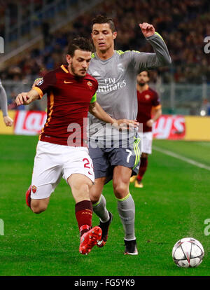 Rome, Italy. 17th Feb, 2016. Real Madrid's Portuguese forward Cristiano Ronaldo (R) fights for the ball with Roma's midfielder from Italy Alessandro Florenzi during the UEFA Champions League roud of 16 fIrst leg football match AS Roma vs Real Madrid CF on February 17, 2016 at the Olimpico Stadium. Credit:  Carlo Hermann/Pacific Press/Alamy Live News Stock Photo