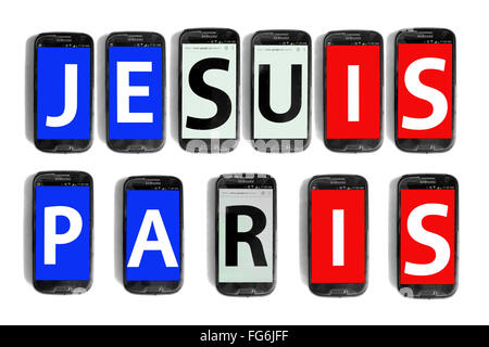 Je Suis Paris written on smartphone screens photographed against a white background. Stock Photo