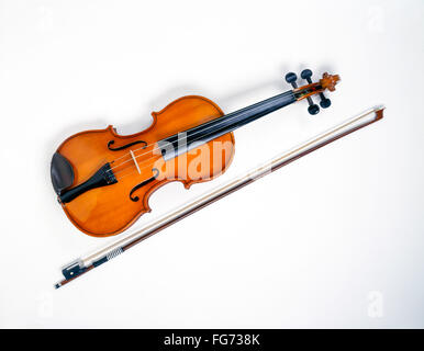 Still-life of violin and bow with white background, Greater London, England, United Kingdom Stock Photo