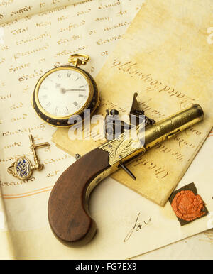 Antique London pistol on ancient scroll, London, England, United Kingdom Stock Photo