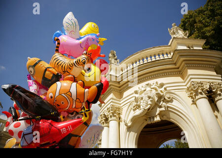 Novelty balloons for sale at the entrance to the Giardino Zoologico or Zoological Gardens, Villa Borghese, Rome, Italy. Stock Photo