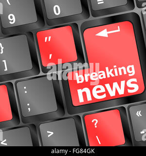 Button with breaking news text and letter symbols on the keyboard Stock Photo