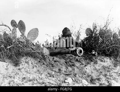 The Nazi propaganda picture shows a soldier of the German Wehrmacht next to an anti-tank gun in North Africa. The photo was taken in January 1943. Fotoarchiv für Zeitgeschichtee - NO WIRE SERVICE - Stock Photo