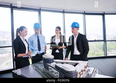 business people and engineers on meeting Stock Photo