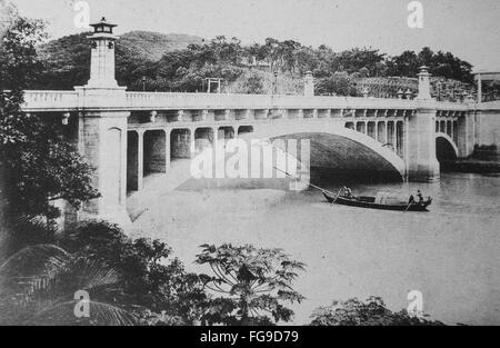 Modernization of Taiwan under Japanese rule. Meiji Bridge ( now Zhongshan Bridge), Taipei, Taiwan. Before 1940. Stock Photo