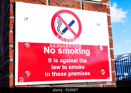 No Smoking sign UK law England GB against the law to smoke in these premises Stock Photo