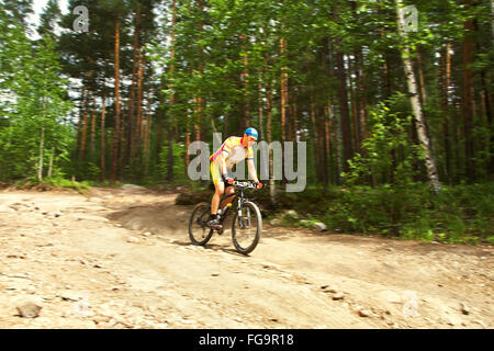 man riding a mountain bike Stock Photo