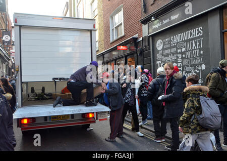 London, UK, 18 February 2016, Hundreds queue at cult skateboard clothing shop Supreme in Peter street in the heart of  Soho as they launch their spring & summer range. Stock Photo