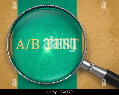 AB Test through Magnifying Glass. Stock Photo