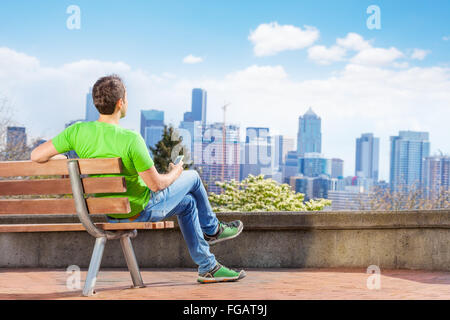 Man enjoy Seattle downtown view from park Stock Photo