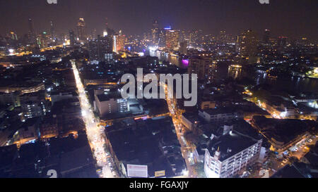 A aerial view above Yaowarat Road towards the Chao Phraya River in Chinatown during Chinese New Year celebrations in Bangkok, Thailand. Stock Photo